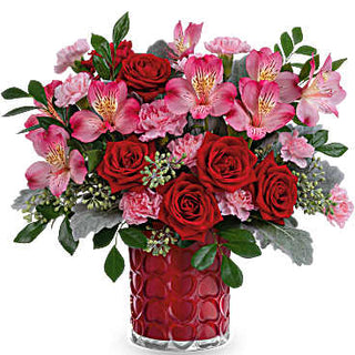 Red roses in a beautiful vase for Valentine's Day. Gifts for wife, gifts for valentines day