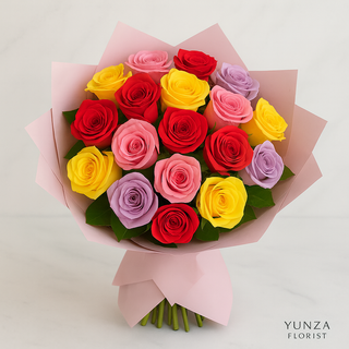 25 mixed roses bouquet featuring red, yellow, pink, and lavender roses wrapped in pastel Korean-style paper with satin ribbon, handcrafted by Yunza Florist Toronto