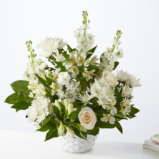 Elegant condolence flower basket – Express sympathy with delivery to Toronto residences