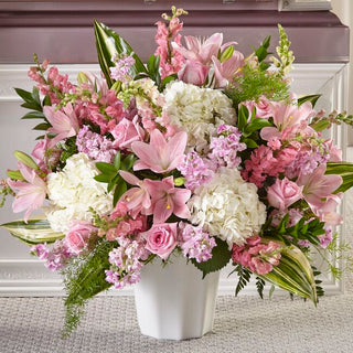 Elegant sympathy floral floor basket perfect for funeral homes, memorial services, or home display