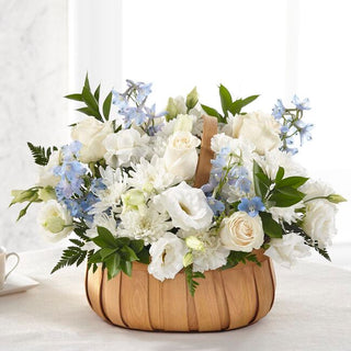 Blue and white flower basket for funeral service – Toronto flower delivery