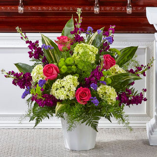 Beautifully crafted sympathy flower floor arrangement ideal for funeral homes or home remembrance