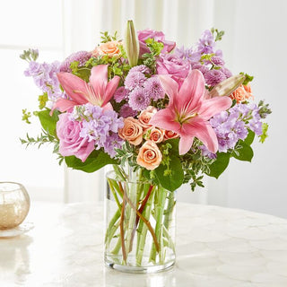 Beautiful funeral flower arrangement with pink lilies and roses – Delivered to homes in Ajax