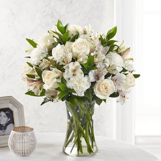 Sympathy floral vase with fresh white roses and carnations, perfect for condolence gifts