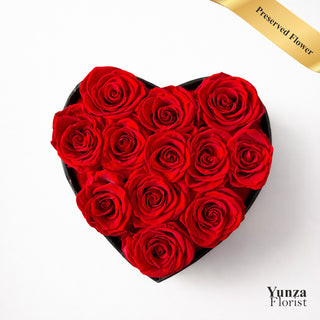 Heart-shaped box of red roses