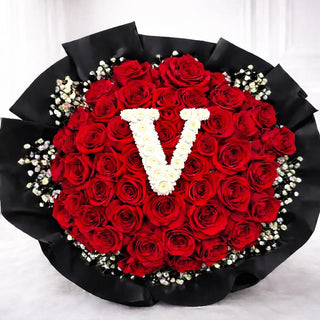 Luxury Valentine’s Day bouquet with red roses and pompom letter design
