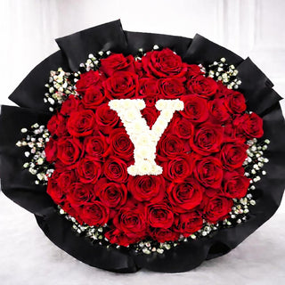 Personalized red rose bouquet with white pompom letter from the best florist