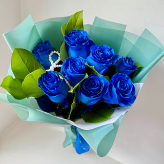 Bouquet of 8 fresh blue roses wrapped in mint green paper – Toronto florist same-day delivery