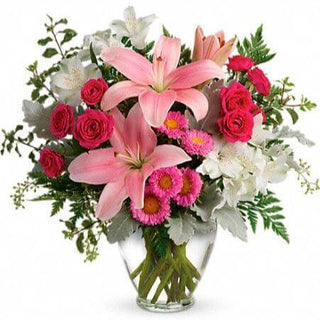 Pink Lilies with red roses flowers. send a gift to a love one in Edmonton