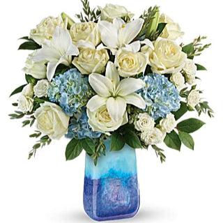 Blue Hydrangea, White Roses, and White Lilies are the best combination for Funeral and Sympathy Flowers By Yunza Florist Toronto