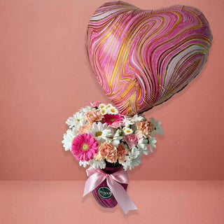 What flowers should I send for Valentine’s Day?” – Answer: The Pink Passion Bouquet is a romantic, thoughtful choice with a heart balloon that adds extra charm