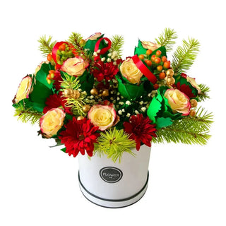 Winter Rose Symphony floral arrangement featuring white roses, red chrysanthemums, gold berries, baby’s breath, and fresh pine greenery in a white hat box by Yunza Florist, holiday bouquet Toronto.