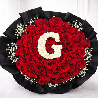 Elegant red roses arrangement with floral initial