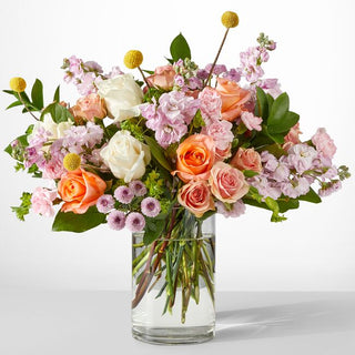 Luxury peach rose and white rose arrangement in a clear vase — soft romantic floral gift for any occasion in Toronto