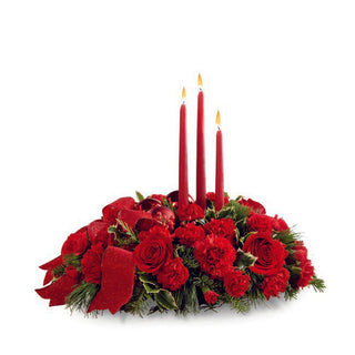 Christmas candle centerpiece in red and green tones for festive home décor