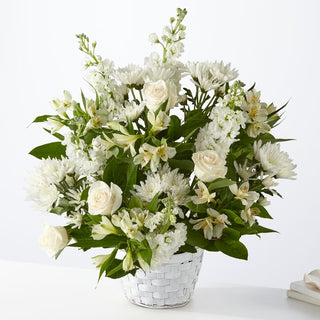 Peaceful flower basket for funeral or grieving family – Same-day delivery to homes in Toronto.