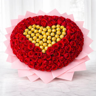 75 premium red roses arranged in a heart shape with Ferrero Rocher chocolates in the center, wrapped in luxury pink Korean paper by Yunza Florist Toronto