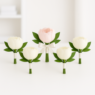 Set of six peony boutonnieres including one for the groom and five for the groomsmen. Elegant pink and white peonies with greenery and ivory ribbon wrap, handcrafted wedding flowers available in Toronto.
