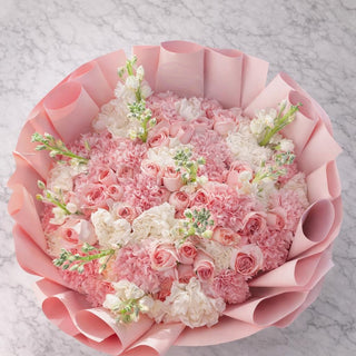 Pink Blossom Dream Bouquet with blush pink roses and soft pink carnations, luxury romantic flower arrangement with elegant wrapping, Toronto flower delivery
