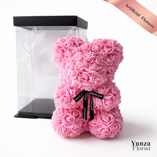 Pink eternal rose teddy bear made with artificial flowers in a clear gift box, luxury Valentine’s Day and Mother’s Day gift
