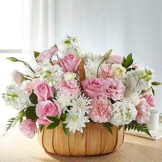 Pink sympathy flower basket with roses and carnations – funeral or home delivery in Toronto