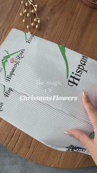 premium winter bouquet features a harmonious blend of creamy white roses, rich red chrysanthemums, seasonal pine greenery, gold berries, and delicate baby’s breath, all beautifully arranged in our signature white hat box.