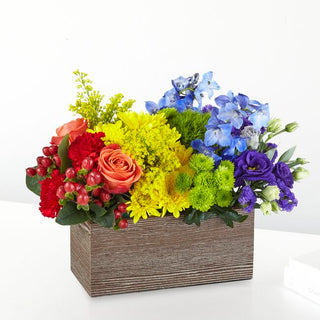 Rainbow-inspired flower arrangement celebrating love, pride, and inclusivity