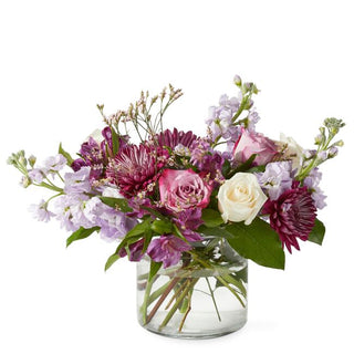 Mixed purple and white bouquet with roses, mums, and stock blooms — stylish gift from Yunza Florist Toronto