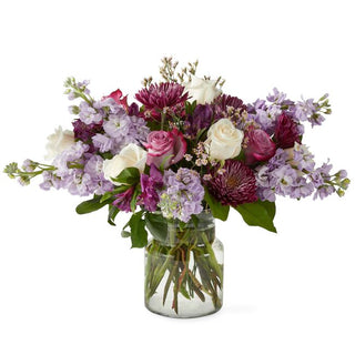 Modern floral vase with purple and ivory roses, handcrafted by Yunza Florist