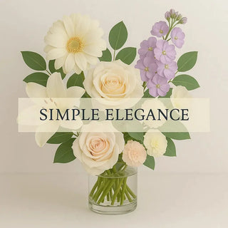 Simple Elegance bouquet with ivory roses, white daisies, lilies, and soft pastel flowers in a clear vase – Yunza Florist Toronto
