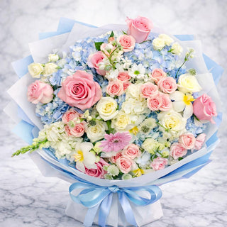 Soft pastel rose and hydrangea bouquet handcrafted by a Toronto florist