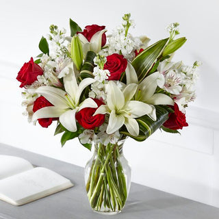 Premium white lilies and red roses sympathy bouquet in vase – flower delivery Toronto