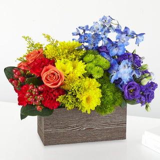 Pride-themed flower bouquet, handcrafted with care and respect by Yunza Florist.