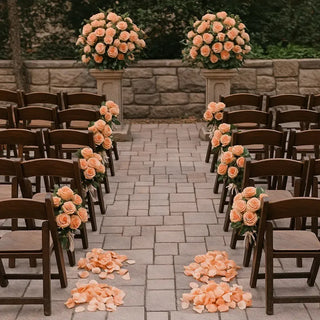 Two large altar arrangements with roses and lush greenery for wedding ceremonies, designed by Yunza Florist Toronto