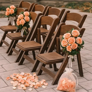 Close-up of chair flower arrangements with peach roses and greenery from Yunza Florist’s wedding aisle collection.